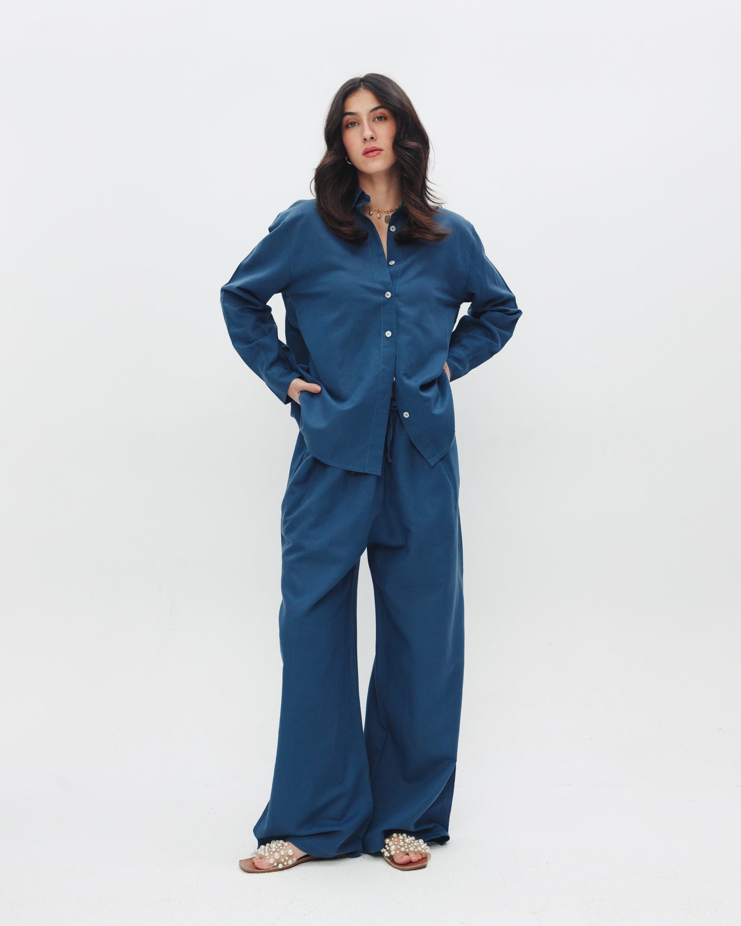 Model wearing women's blue linen pants from Chocka Egypt