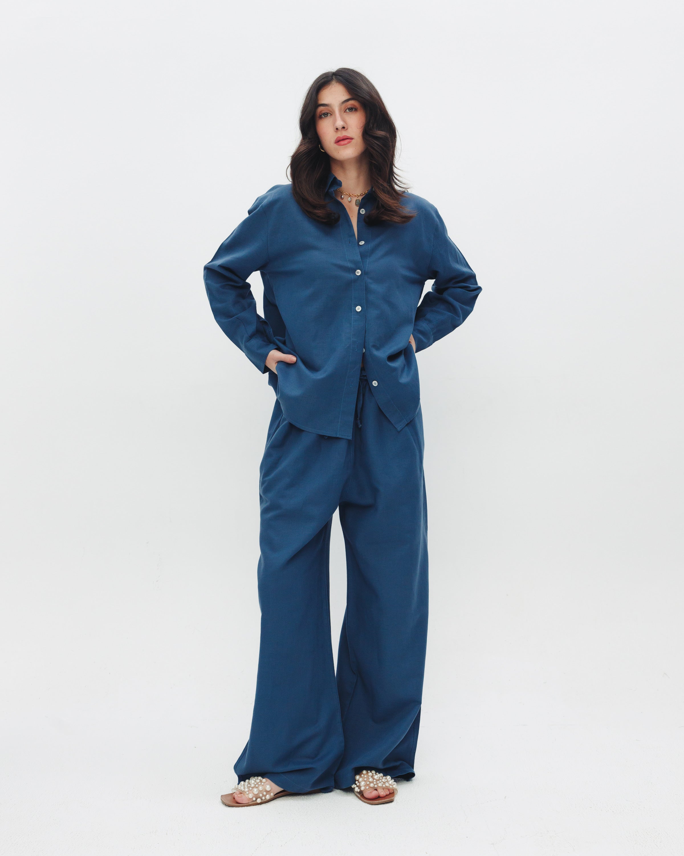 Model wearing women's blue linen pants from Chocka Egypt