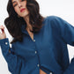 Model wearing women's blue linen shirt from Chocka Egypt
